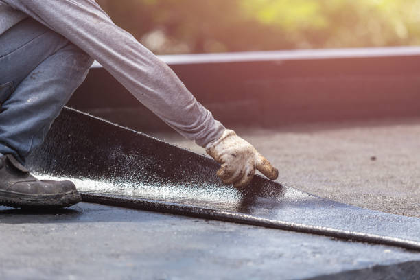 Professional Basement Waterproofing technician working in Orient, NY